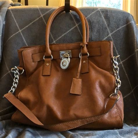 michael kors purse with lock on front